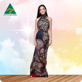 Woman in a patterned dress standing on a wooden floor with a colorful gradient background, Australian Made logo visible.